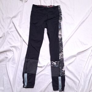 Lululemon | Black multicolored asymmetrical leggings with zippers
